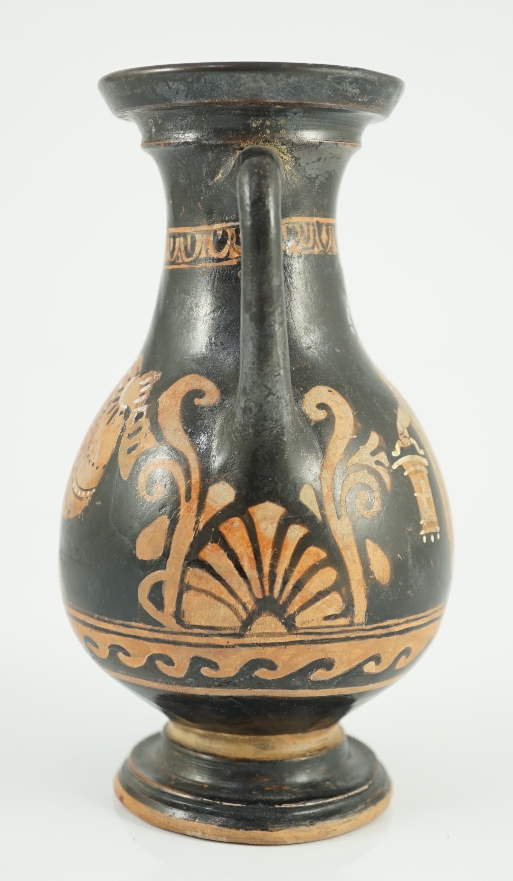 An Apulian red figure Pelike, 4th century BCE., 15.3cm high, restored